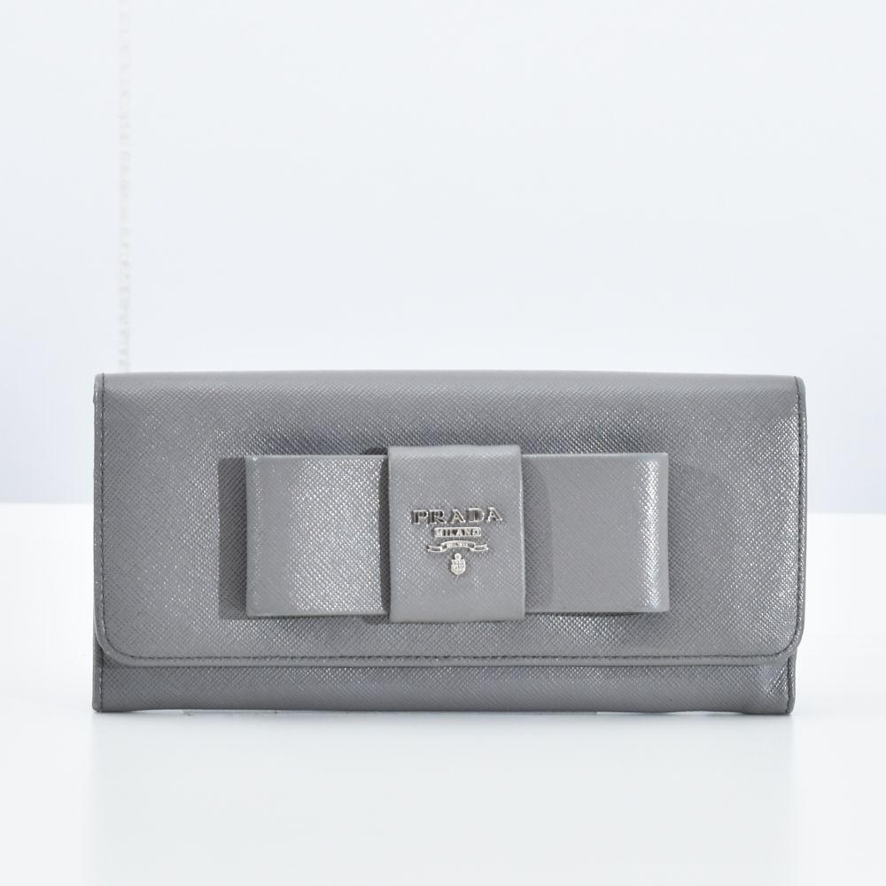 中古USED PRADA 財布 フラップ リボン サフィアーノ 7929226882 中古USED PRADA 財布 フラップ リボン サフィアーノ 7929226882
