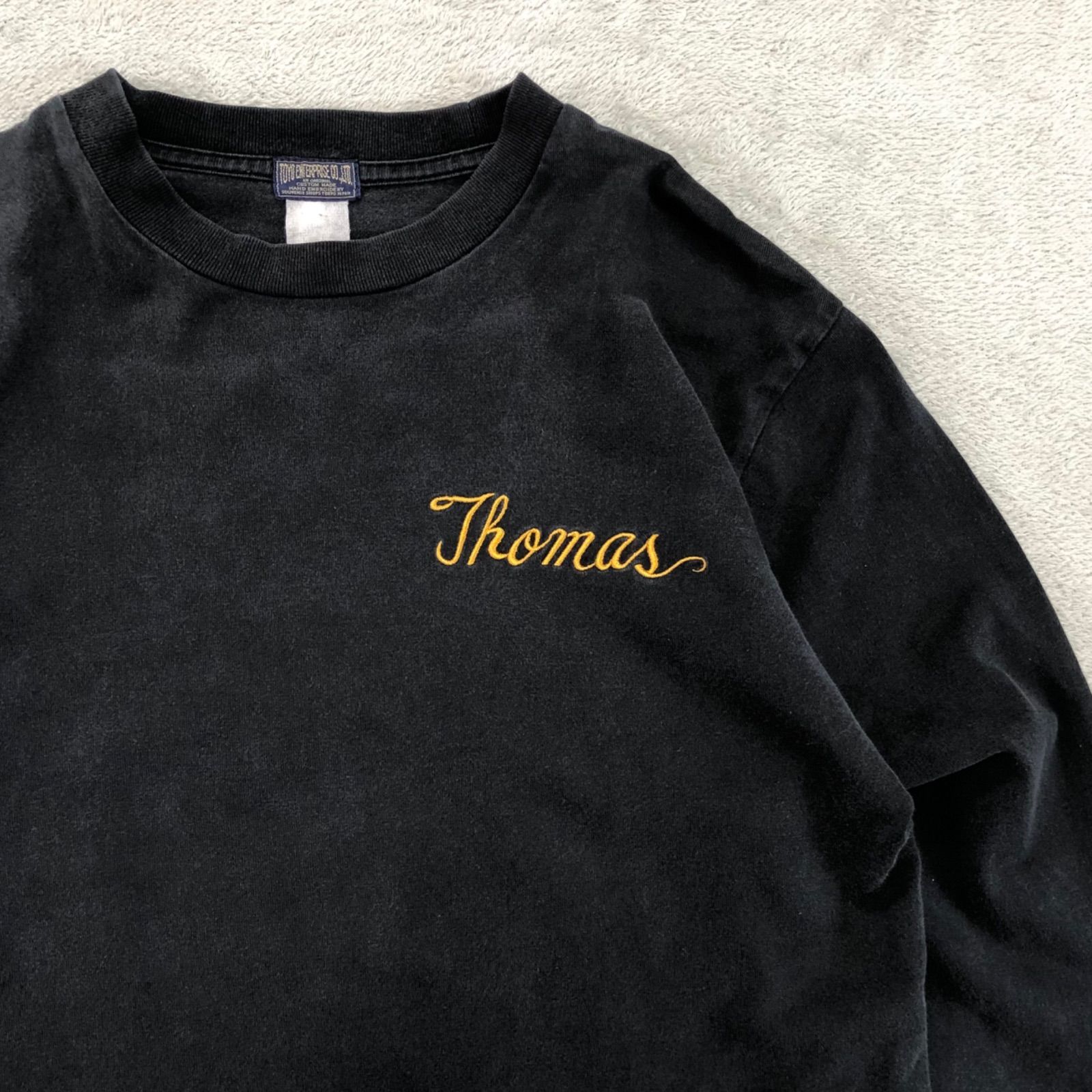 東洋エンタープライズ ロングスリーブTシャツ スカT スーベニア刺繍 ネーム刺繍 Thomas スカル ドクロ Black Guns ロンT 長袖カットソー ブラック 黒