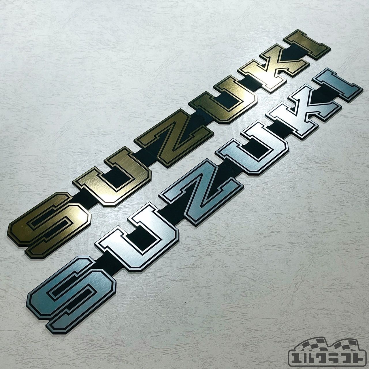 ユルクラフトオリジナルエンブレム　スズキカレッジロゴグリルエンブレムインパクト（超ビッグサイズ）1つの価格になります。 カラーはステンレス、アンティークゴールド、ホワイトか