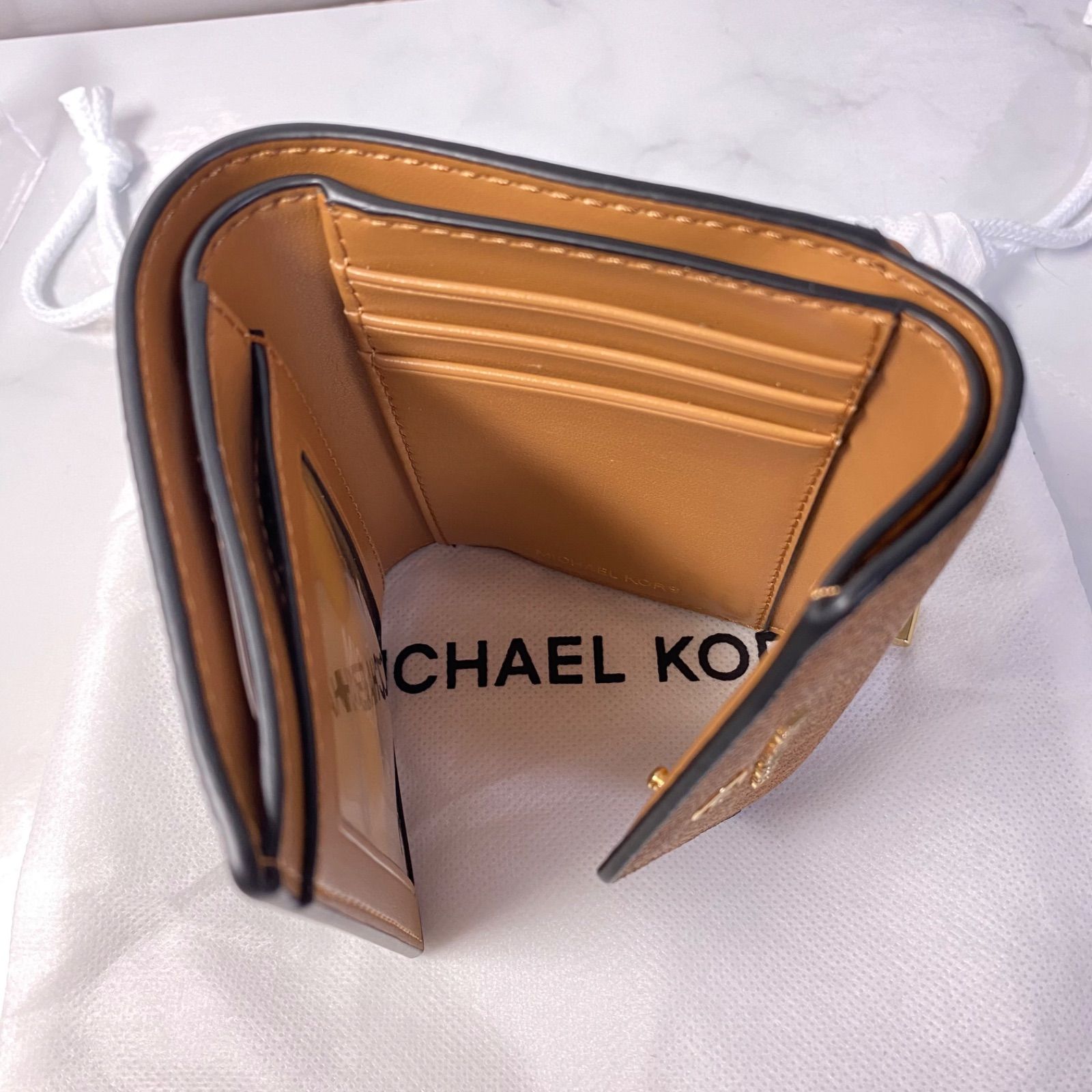 新品・未使用 MICHAEL KORS マイケルコース シグネチャー 三つ折り財布 