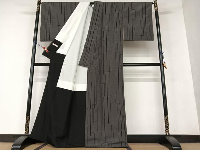 平和屋着物○本塩沢 110亀甲 変わり市松文 黒地 正絹 逸品 未使用