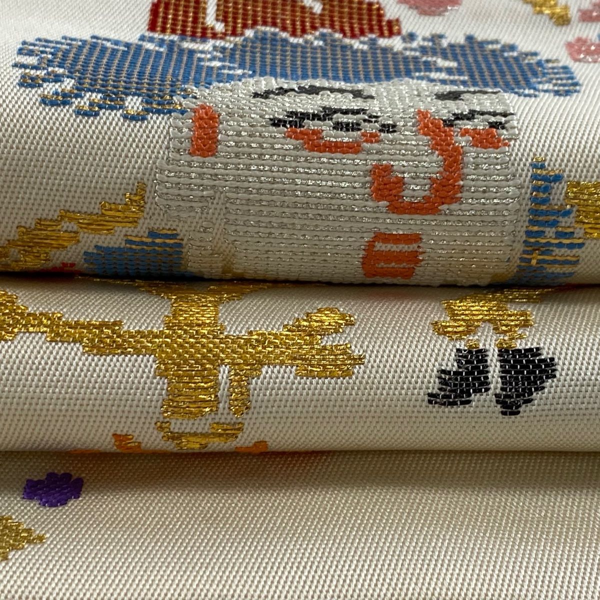 袋帯 逸品 龍村平蔵 落款 人形手糸入錦 草花 箔 クリーム お太鼓