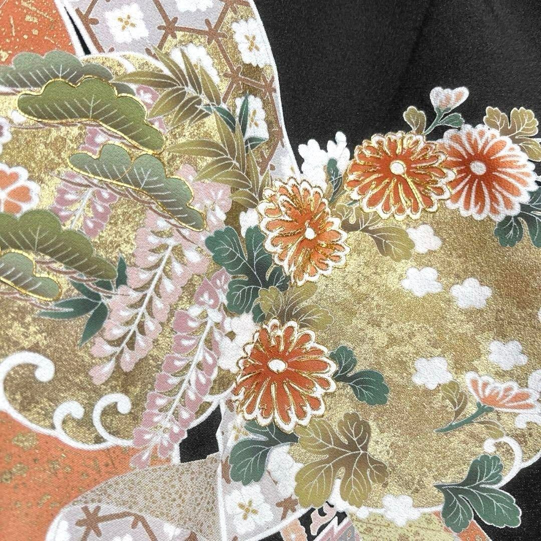 じゅらく　黒留袖　帝王紫　金駒刺繍　裂取り　伝統和模様　花　着物　041a d 未着用 黒留袖 金駒刺繍 金彩 熨斗 菊花 藤 伝統和模様 着物