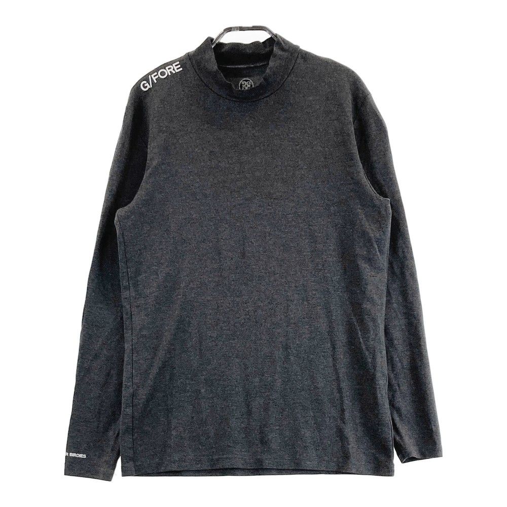 サイズ：2 G/FORE ジーフォア  モックネック 長袖Tシャツ  グレー系 [240101460184] ゴルフウェア メンズ ストスト サイズ：2 G/FORE ジーフォア モックネック 長袖Tシャツ グレー