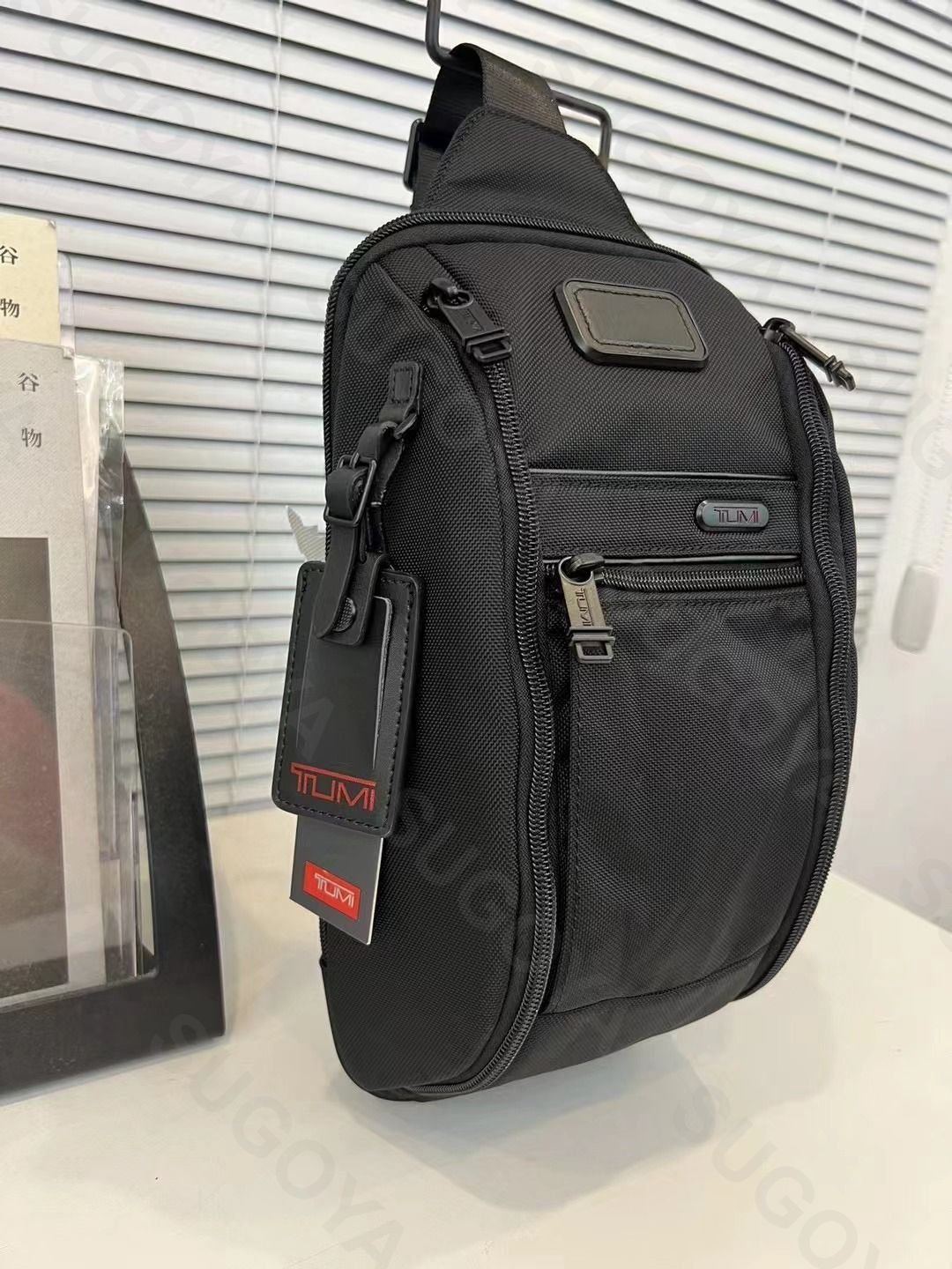 新品✨未使用TUMI [トゥミ]ボディバッグウエストポーチウエストバッグ斜めかけ メンズバッグブラック26303214仕事用通勤通学ランニングポーチ