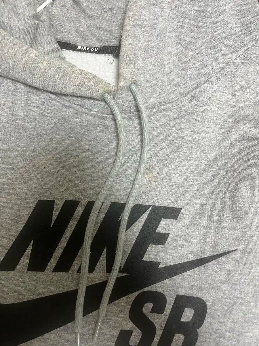 Nike(ナイキ） SB グレー フード付きTシャツ - メルカリ