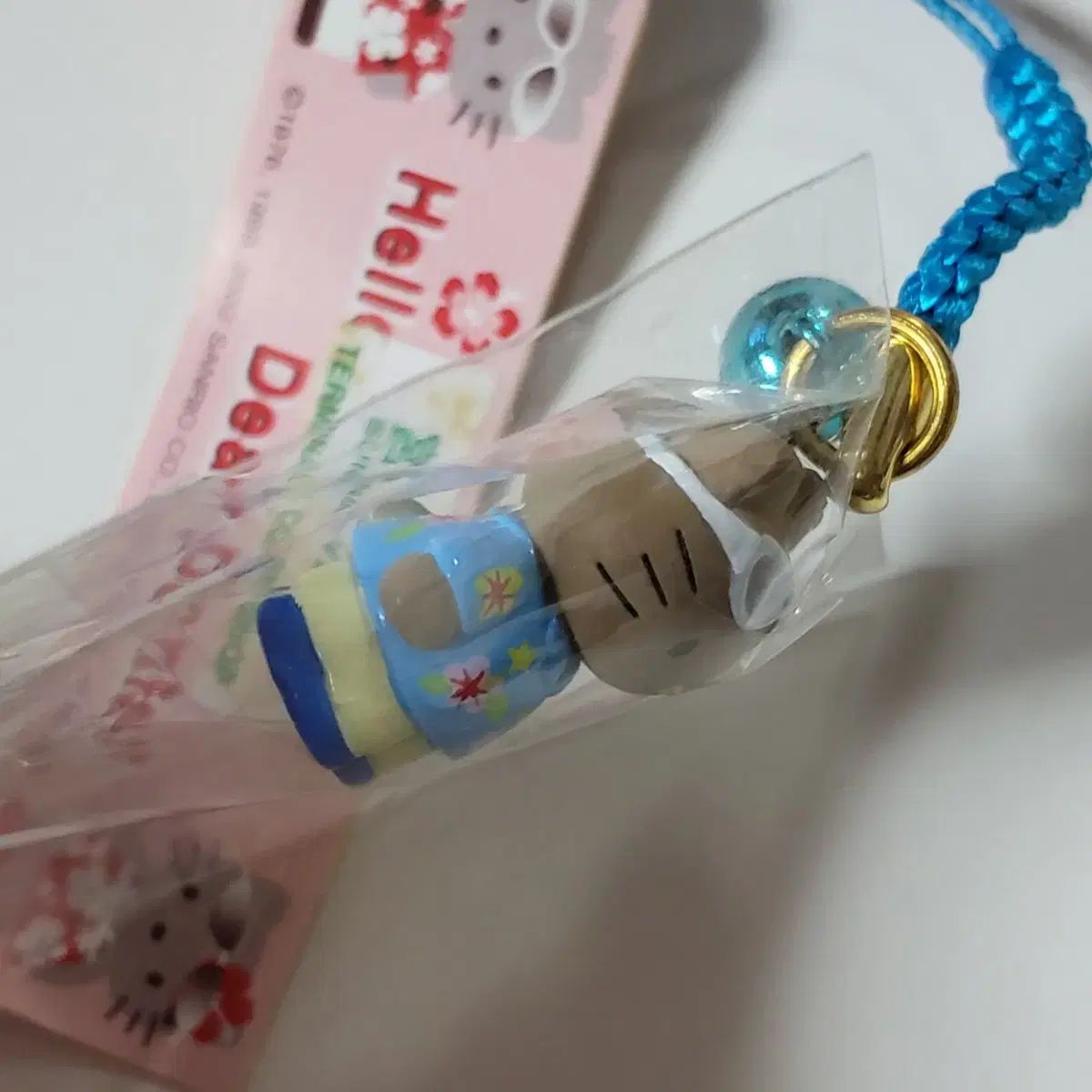 ハローキティ 沖縄 宮古島 限定 鹿 ダニエル ストラップ 日焼け