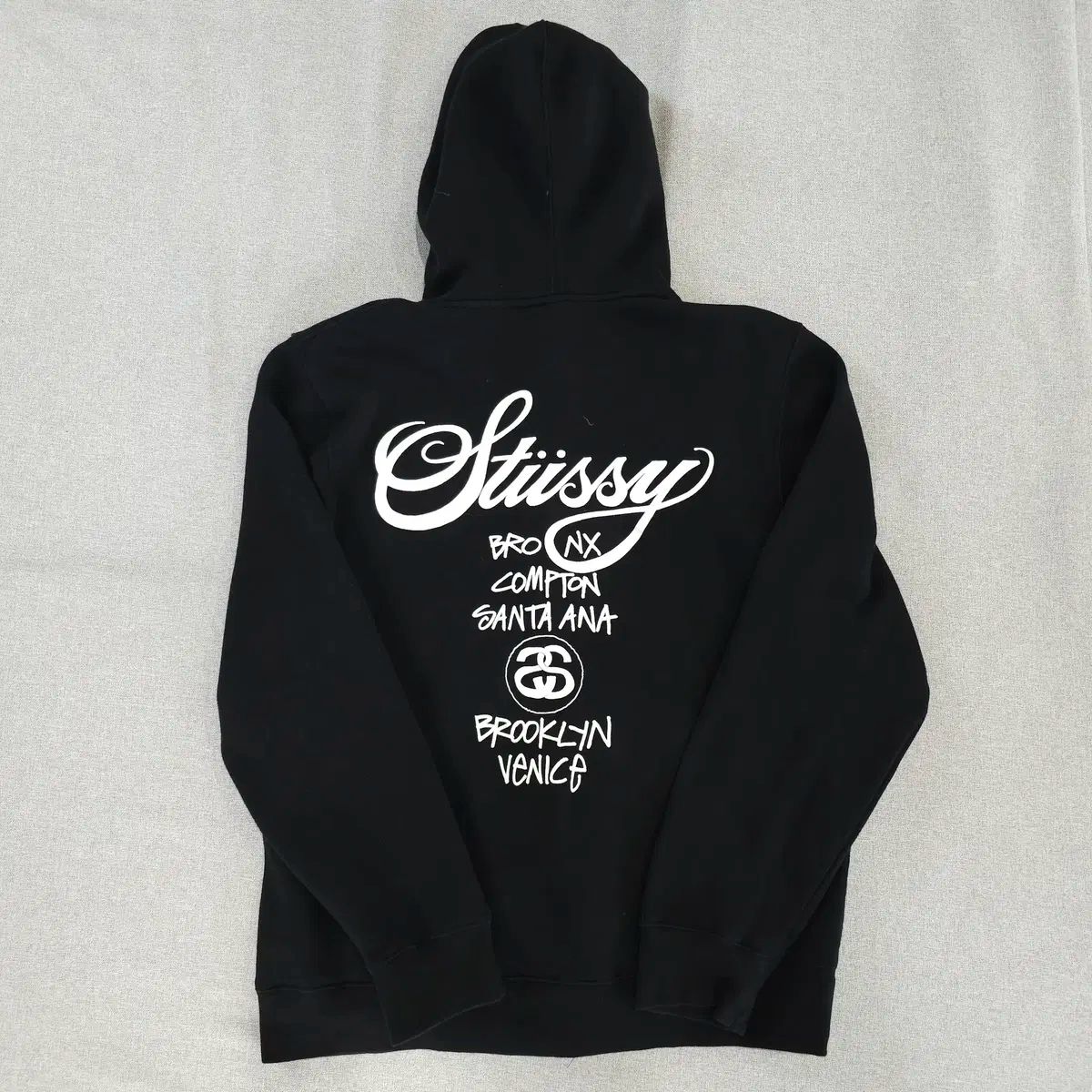 Stüssy 黒 フード付きパーカー Stüssy 黒 フード付きパーカー