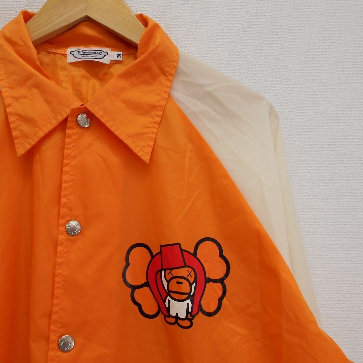 APE × KAWS baby milo ナイロン コーチジャケット/M APE × KAWS baby milo ナイロン コーチジャケット/M - メルカリ
