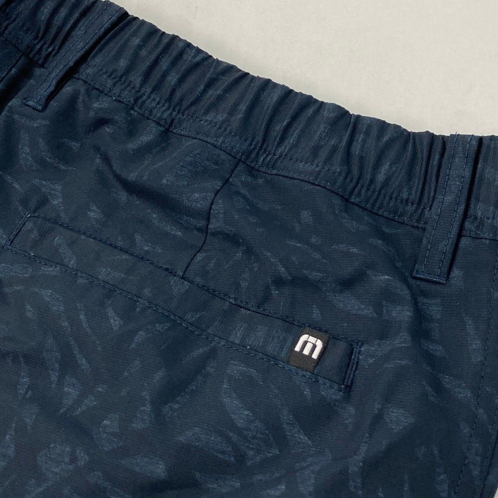 サイズ：XL TRAVIS MATHEW トラビスマシュー  ロングパンツ 総柄 ブラック系 [240101449544] ゴルフウェア メンズ ストスト サイズ：XL TRAVIS MATHEW トラビスマシュー ロングパンツ 総柄