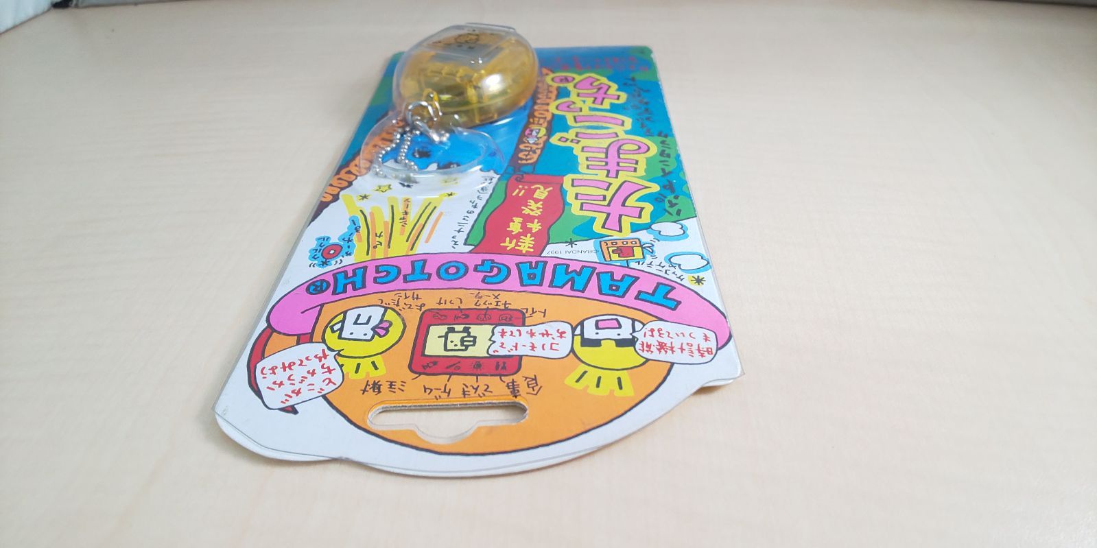 新種発見たまごっち（スケルトンオレンジ）【BANDAI 1997】 海で発見