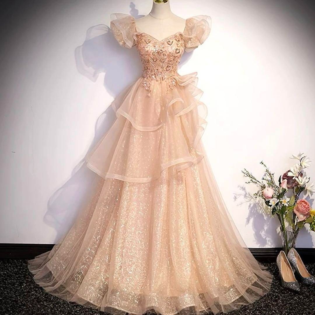小花柄の様なデザインにフリルが イブニングドレス?.?