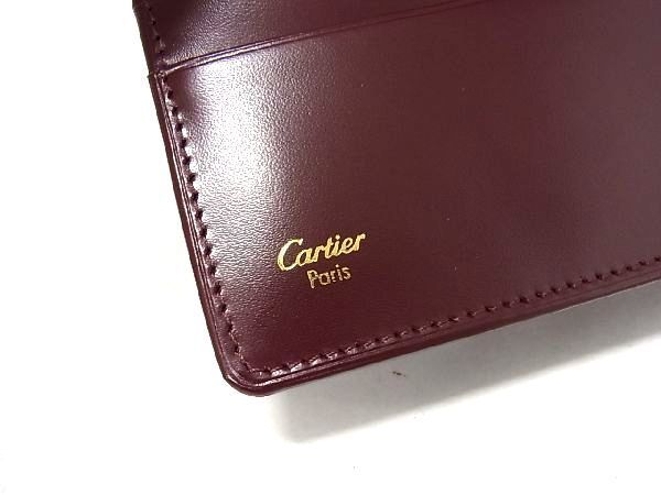 新品 未使用 Cartier マストライン 二つ折り財布 ウォレット ボルドーロゴエンボスボルドー男女兼用