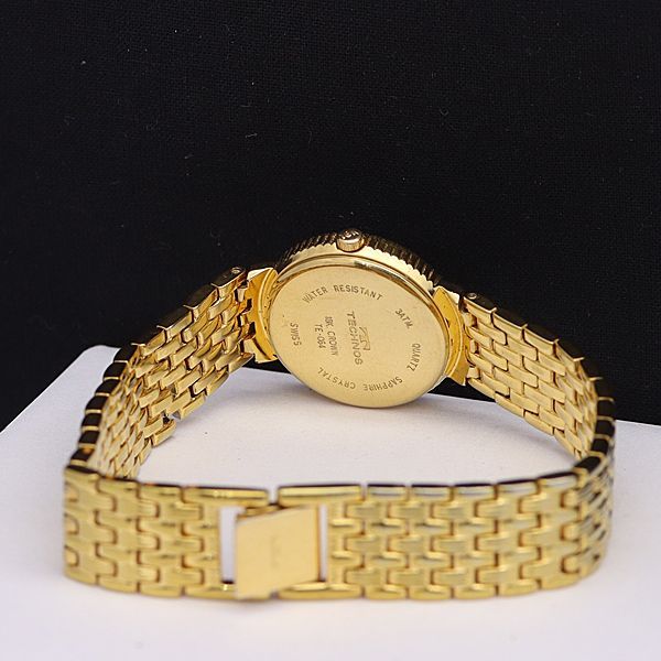 スイス製　TECHNOS テクノス 18K GOLD CROWN TE-064 稼働 良品 テクノス QZ TE-064 18Kクラウン 白文字盤 石付