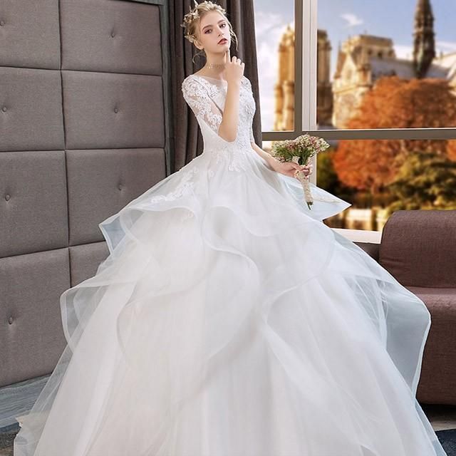 ウェディングドレス 5分丈袖 透かし彫り キレイめ 結婚式ドレス フレア フリル花嫁 ホワイトドレス ブライダルドレス 披露宴 ウェディングドレス 5分丈袖 透かし彫り キレイめ 結婚式ドレス フレア