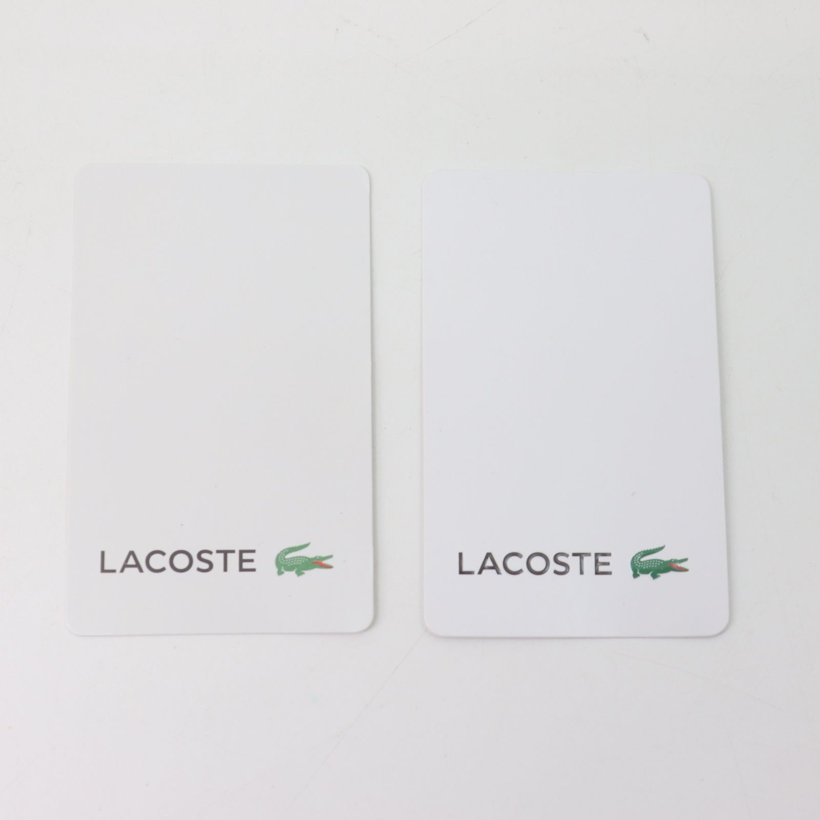 IT7YALCUWJAW 未使用 LACOSTE ラコステ レザー 二つ折り財布 さいふ NH1407FG お財布 小銭入れなし カード入れ 黒 ブラック マーク ロゴ ワニ メンズ レディース