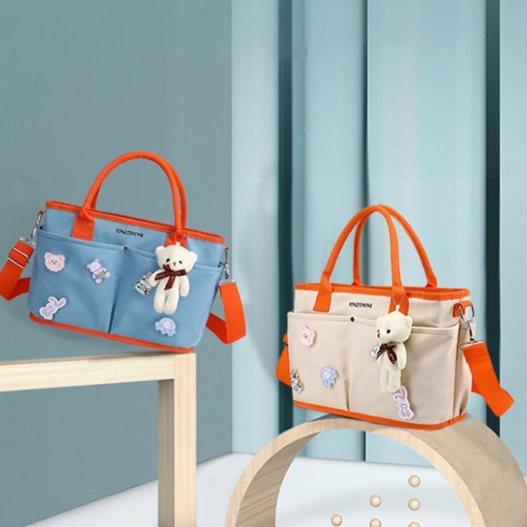 TORY BURCH　マザーズバッグ　ショルダー　おむつマット付き TORY BURCH マザーズバッグ ショルダー おむつマット付き 潜ら