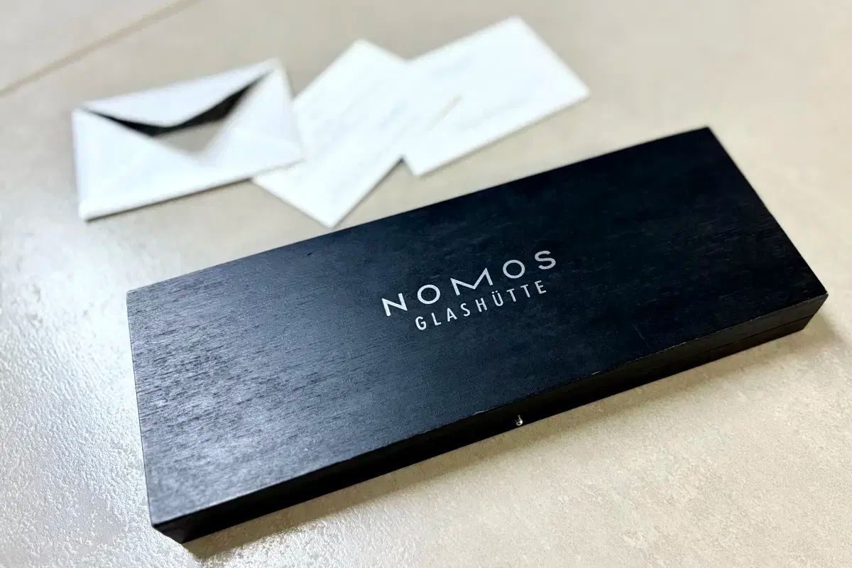 卍 NOMOS
