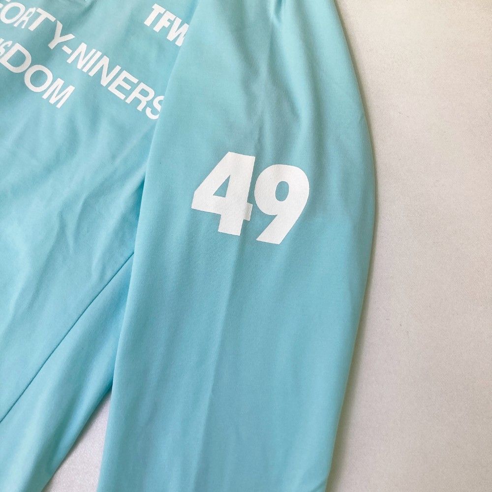 サイズ：M TFW49 ティーエフダブリューフォーティーナイン  ハーフジップ長袖Tシャツ  ブルー系 [240101443730] ゴルフウェア レディース ストスト サイズ：M TFW49 ティーエフダブリューフォーティーナイン