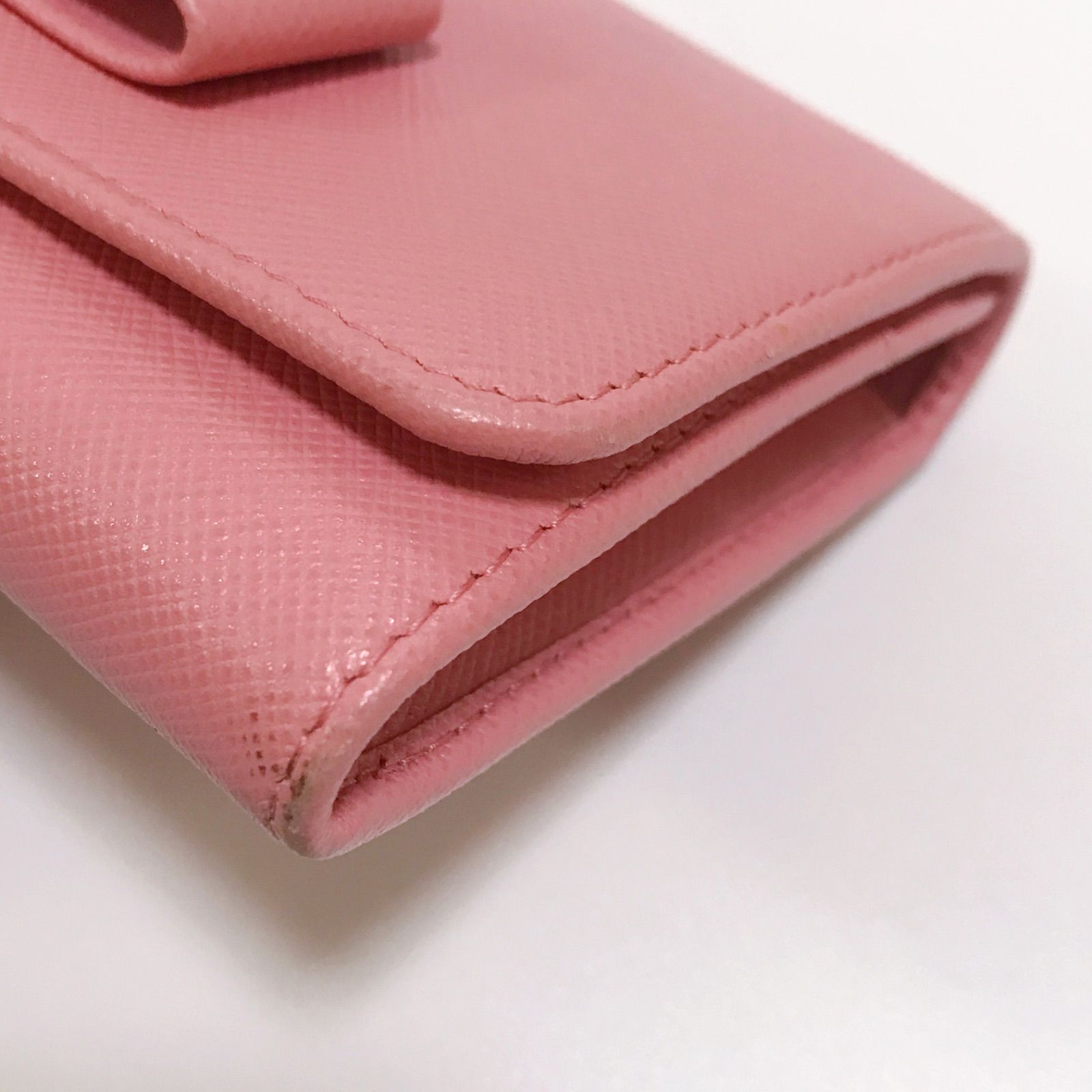 鑑定済みプラダ 定番リボンフラップ長財布 サフィアーノレザー