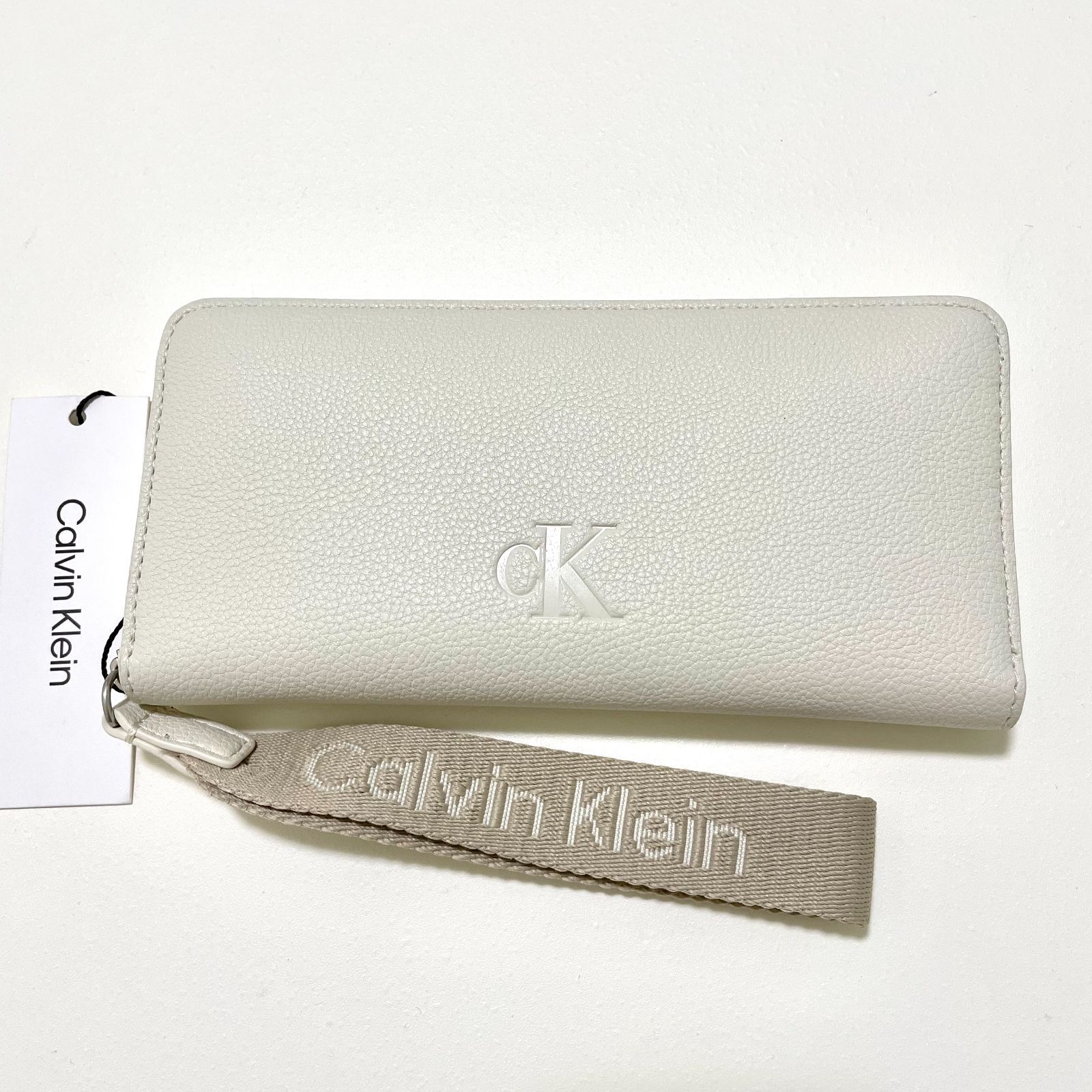 【未使用】カルバンクライン 折り財布 ウォレット ラウンドジッパー シルバーロゴ カルバンクライン 長財布 ウォレット ラウンドファスナー ロゴ