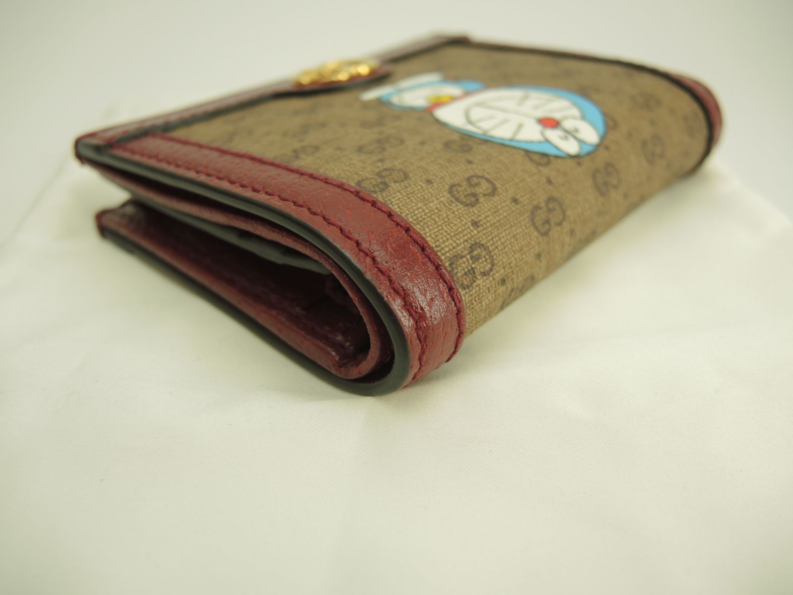 グッチ 2折財布 ドラえもん マイクロGG茶エンジ コンパクト