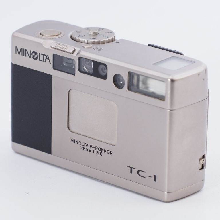 ジャンク品】MINOLTA コンパクトフィルムカメラ TC-1 ミノルタ G-ROKKOR 28mm f/3.5 ケースつき - メルカリ