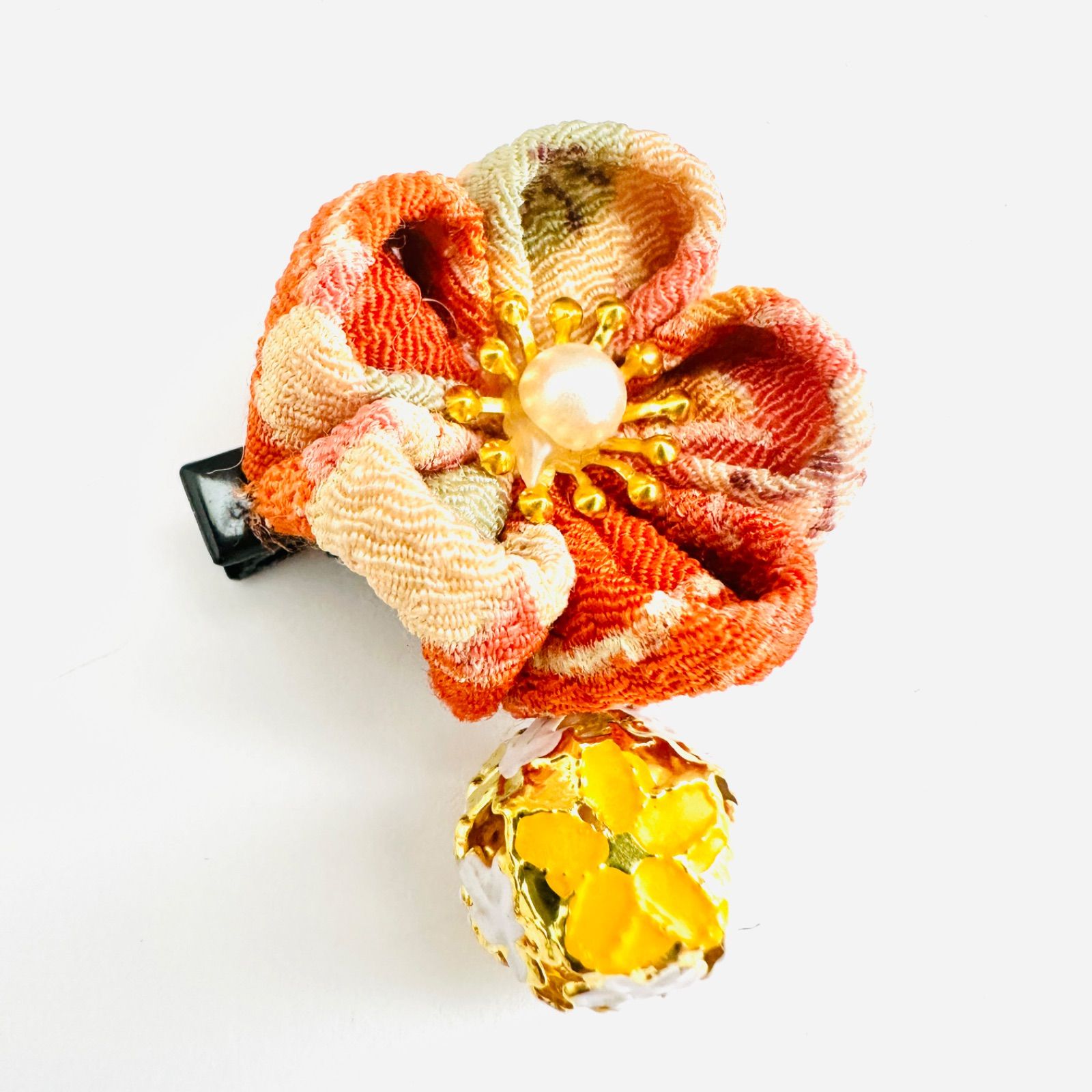 カラフル花モチーフヘアクリップオレンジ