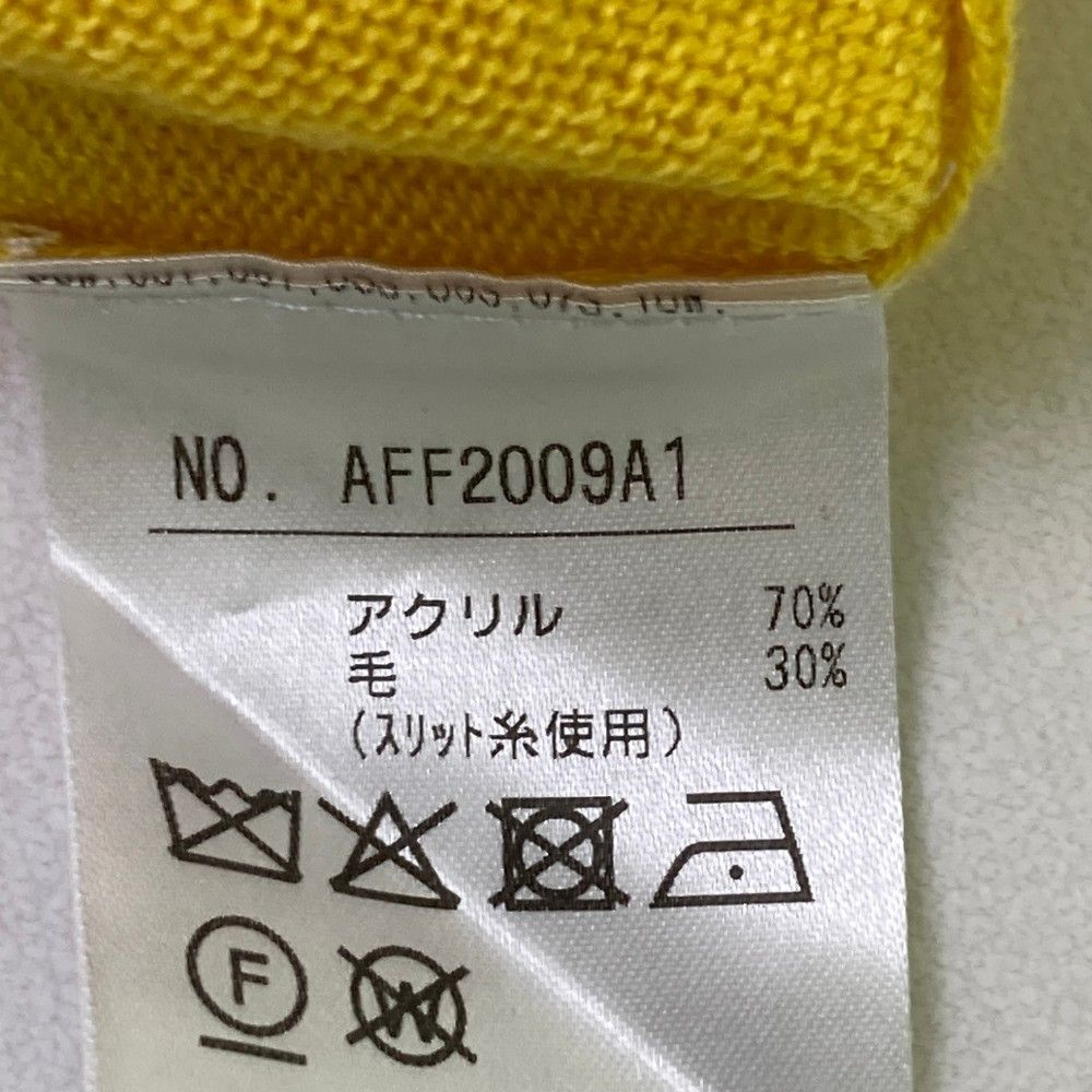 サイズ：L AND PER SE アンパスィ  Vネック ニットベスト ロゴ  イエロー系 [240101464336] ゴルフウェア レディース ストスト AND PER SE アンパスィ Vネック ニットベスト ロゴ イエロー系