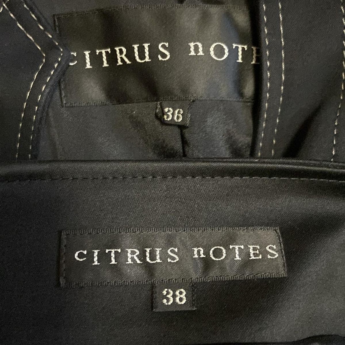 新品 タグ付 cITRUS nOTES シトラスノーツ 38 スーツ ストレッチ CITRUS NOTES(シトラスノーツ) スカートスーツ レディース - 黒