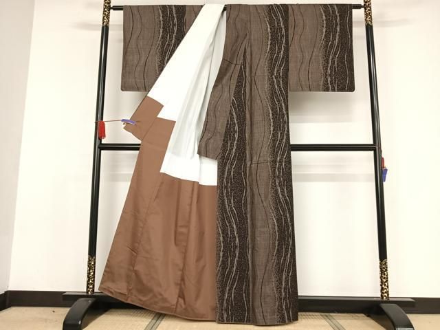 平和屋着物○本場大島紬 純泥染 手織 カタス7マルキ 流水文 岡江織物