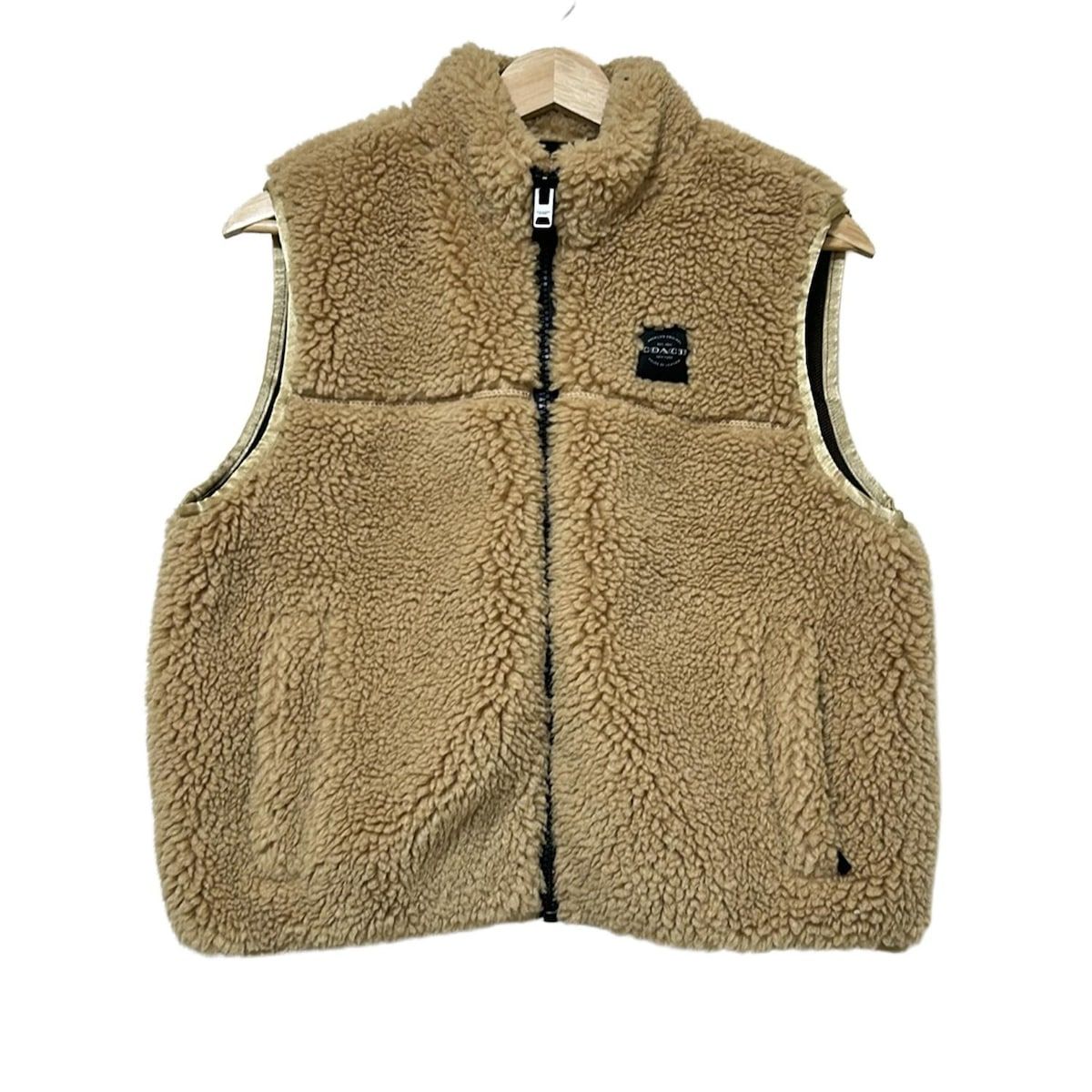 COACH コーチ ベスト サイズS レディース - ベージュ フェイクファー