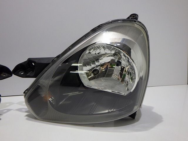 美品 ミライース ヘッドライト左右LA300系後期 100-51090 ア499