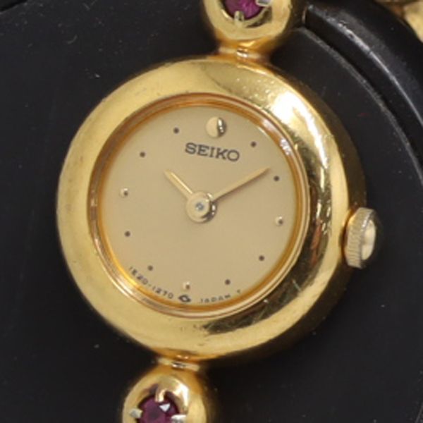 QZ セイコー 石付 ゴールド文字盤 1E20-0420 レディース腕時計