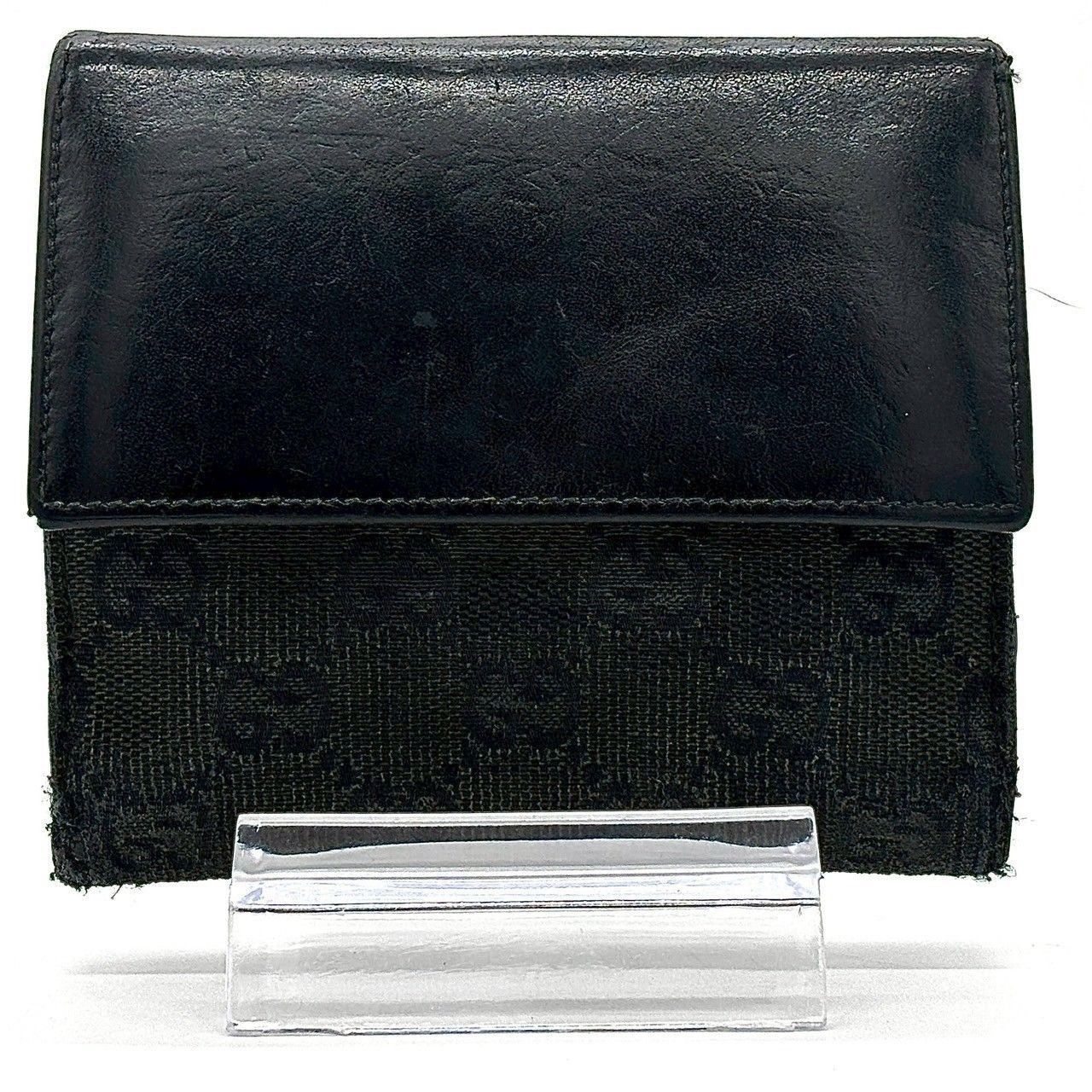 GUCCI グッチ　二つ折り財布　シマ　総柄　型押しロゴ　キャンバス　レザー GUCCI グッチ GG柄 グッチシマ シマレザー 本革 型押し 二つ折り