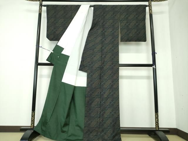 平和屋着物○本場結城紬 重要無形文化財 80亀甲 幾何学文様 黒地 大丸