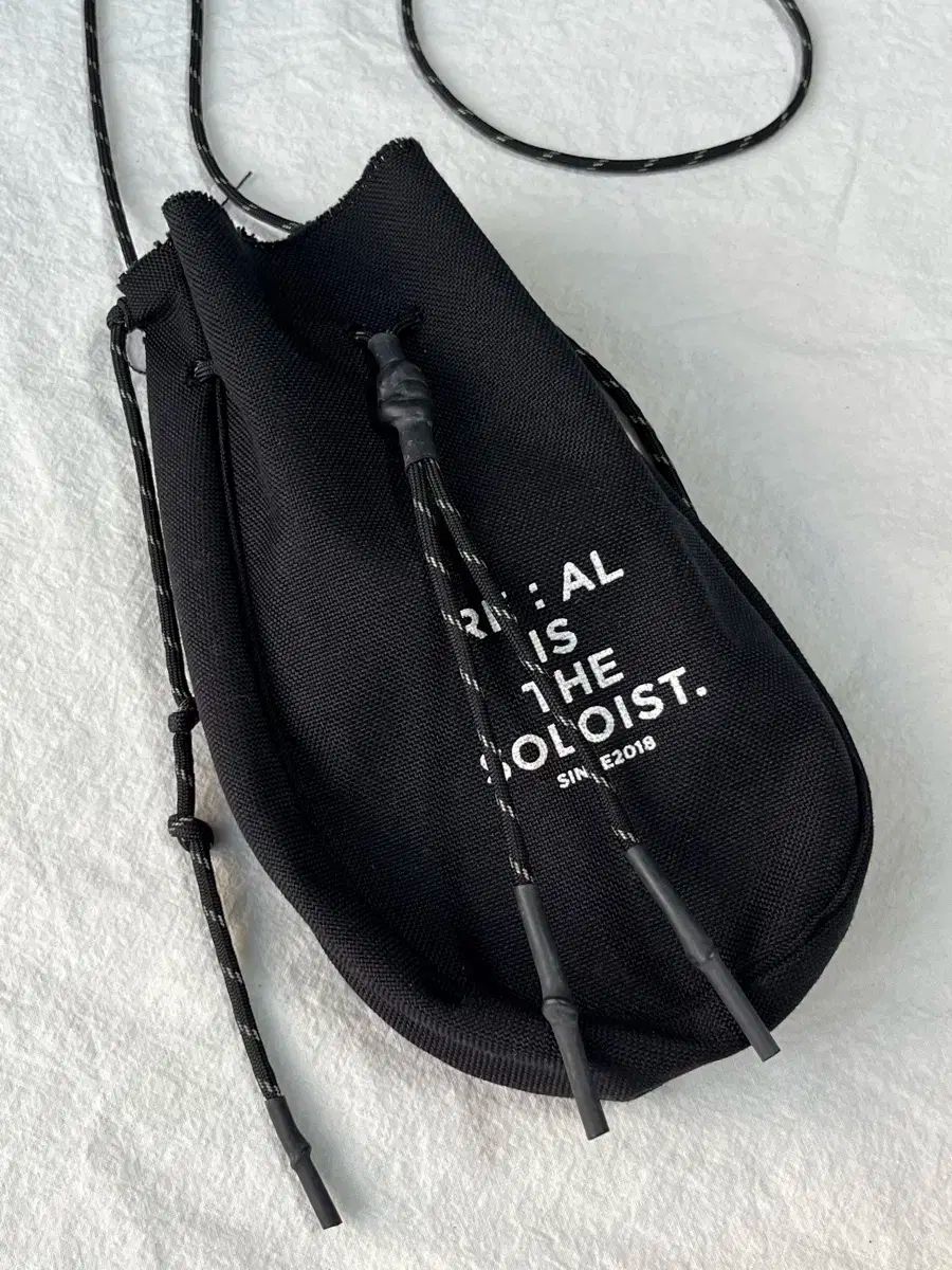 タマヒロミヤシタ ザ ソロイスト ドローストリングバッグ クロスバッグ バッグ