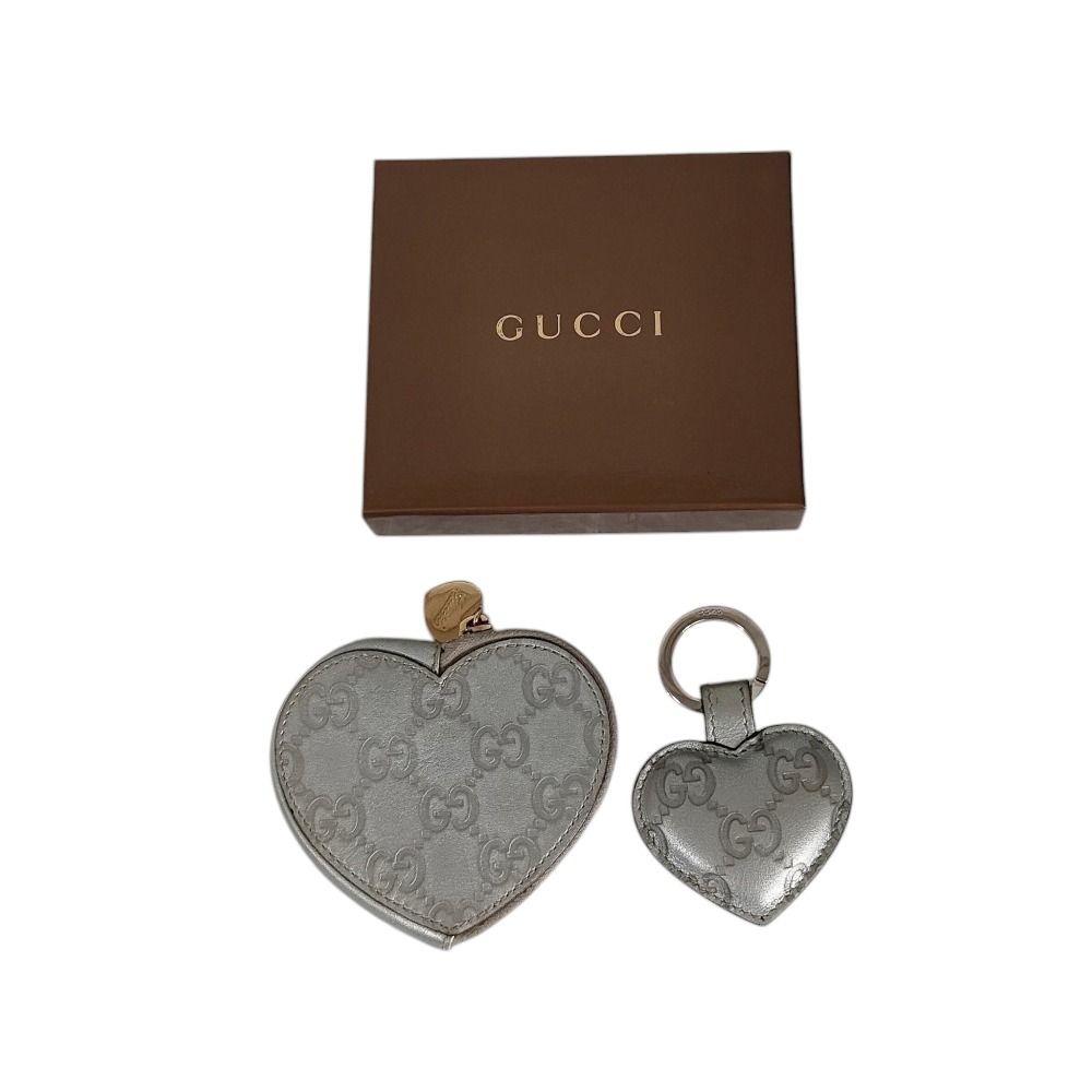 【未使用品】GUCCI グッチ　ハート型チャーム レザー GGロゴ付き　箱つき GUCCI グッチ GG PVCレザーリボン ハート二 つ折り財布 ホワイト