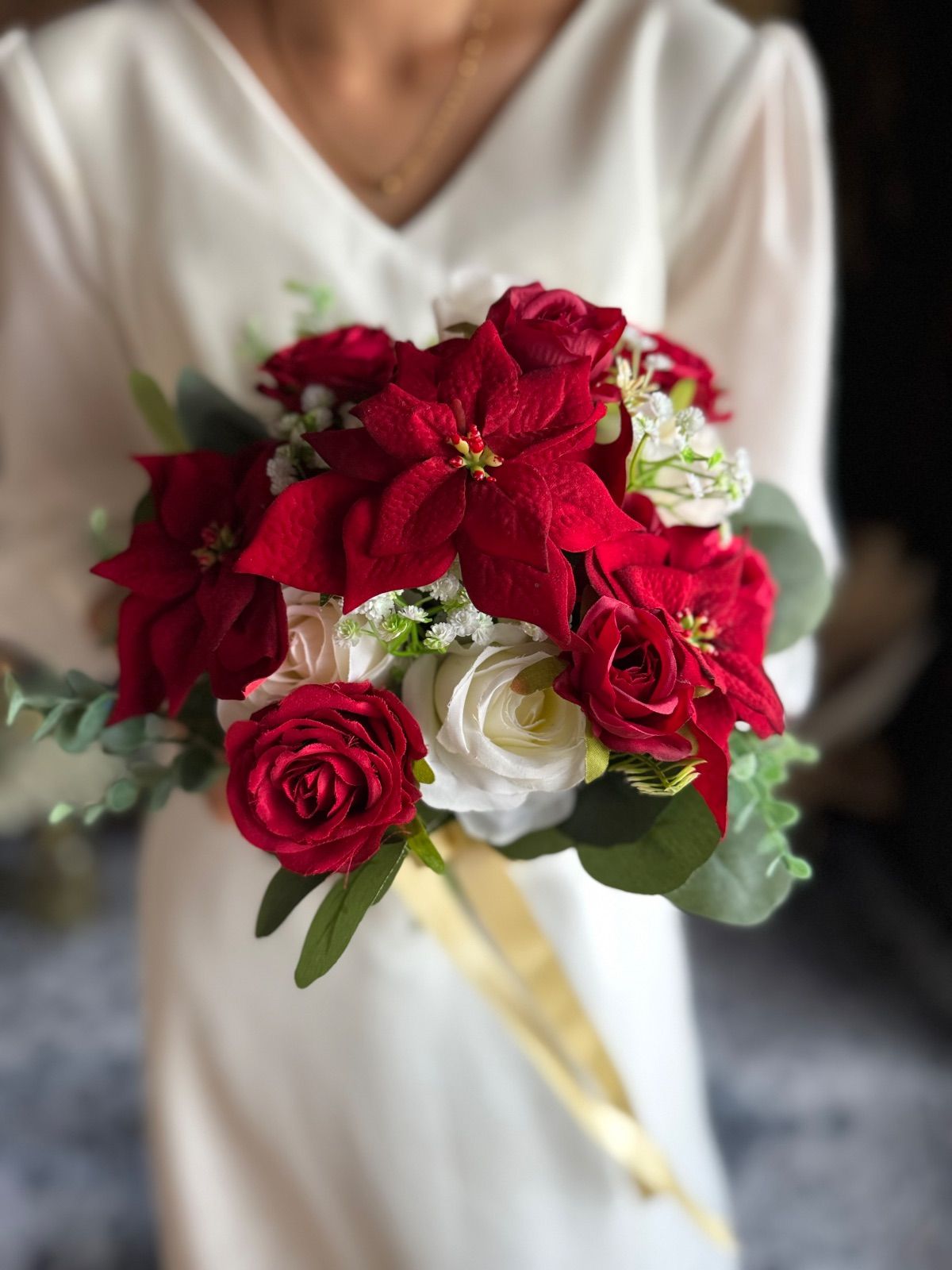 ポインセチアクラッチブーケ ブートニア