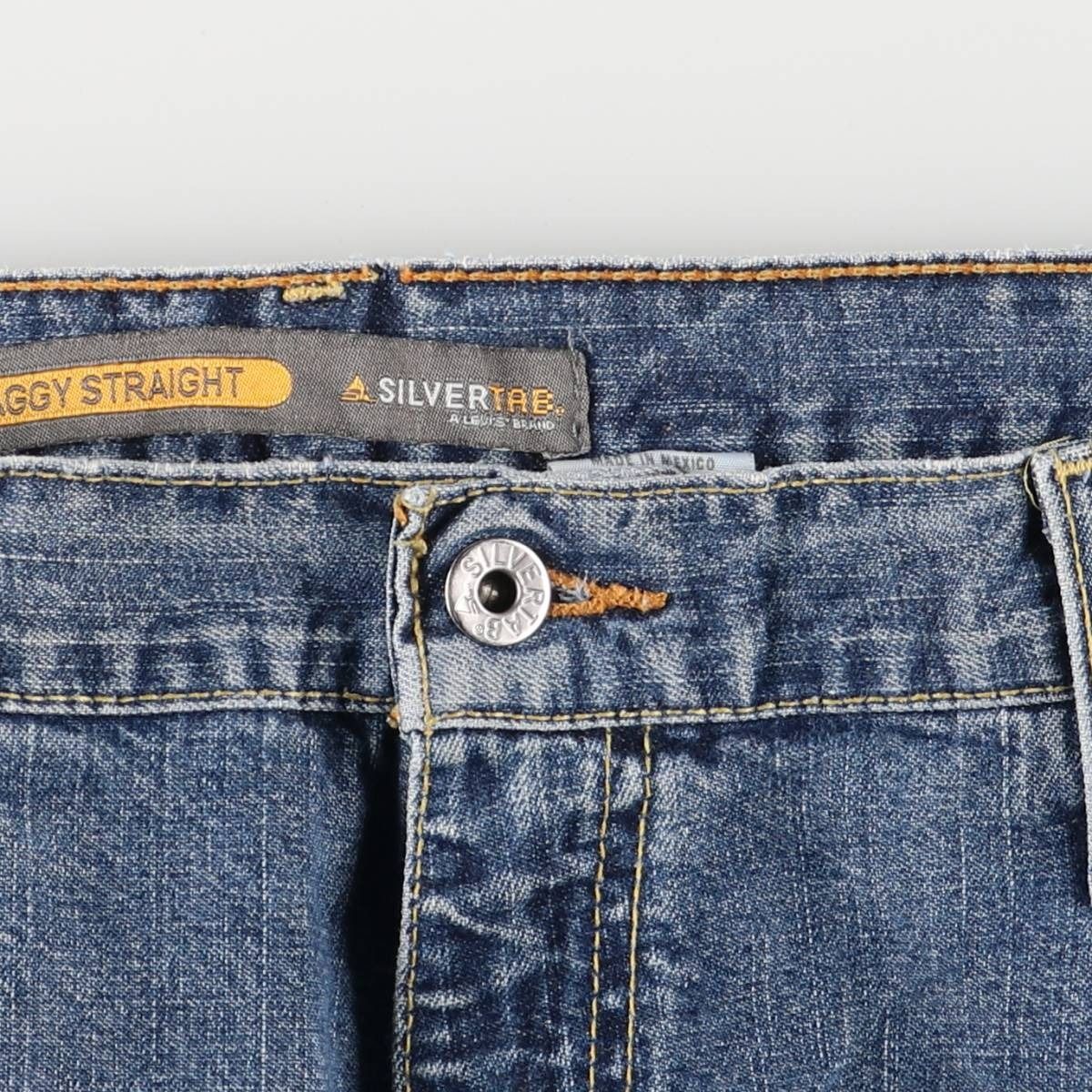 テーパードデニムパンツ