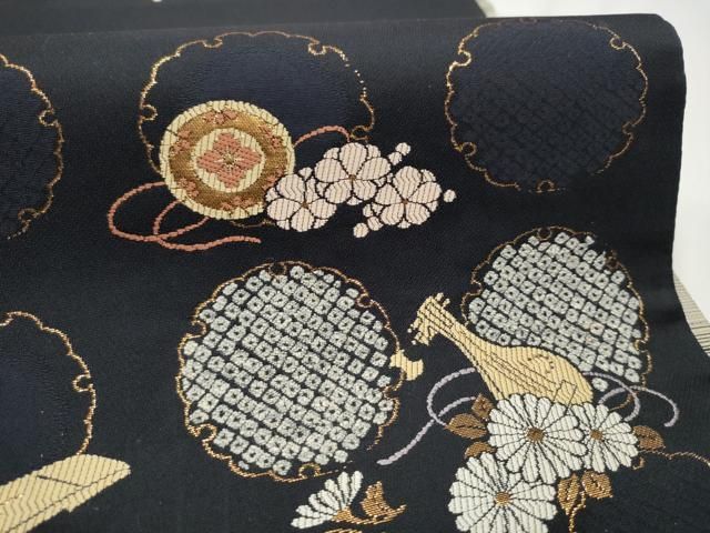 六通柄袋帯 雪輪楽器舞花文