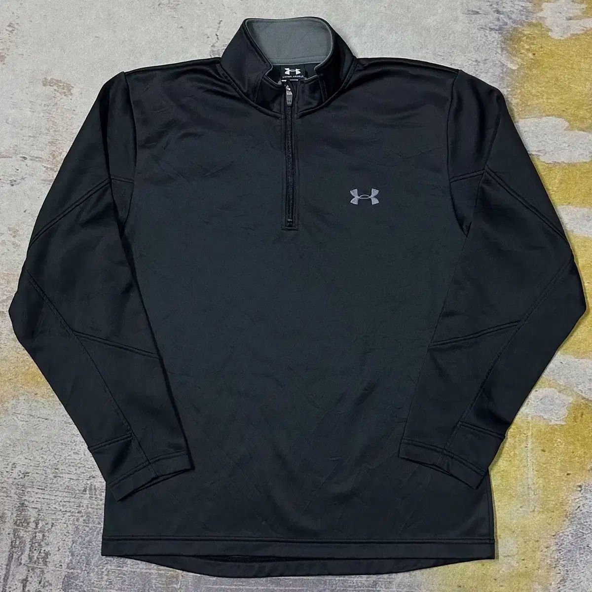 UNDER ARMOUR(アンダーアーマー) ハーフジップ トラックトップス