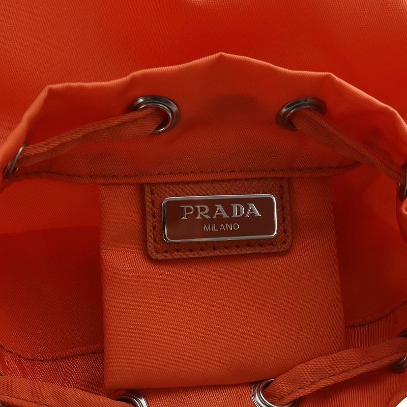 美品✨プラダ PRADA 三角ロゴ リナイロン 巾着バッグ ポーチ オレンジ 美品✨プラダ PRADA 三角ロゴ リナイロン 巾着バッグ ポーチ