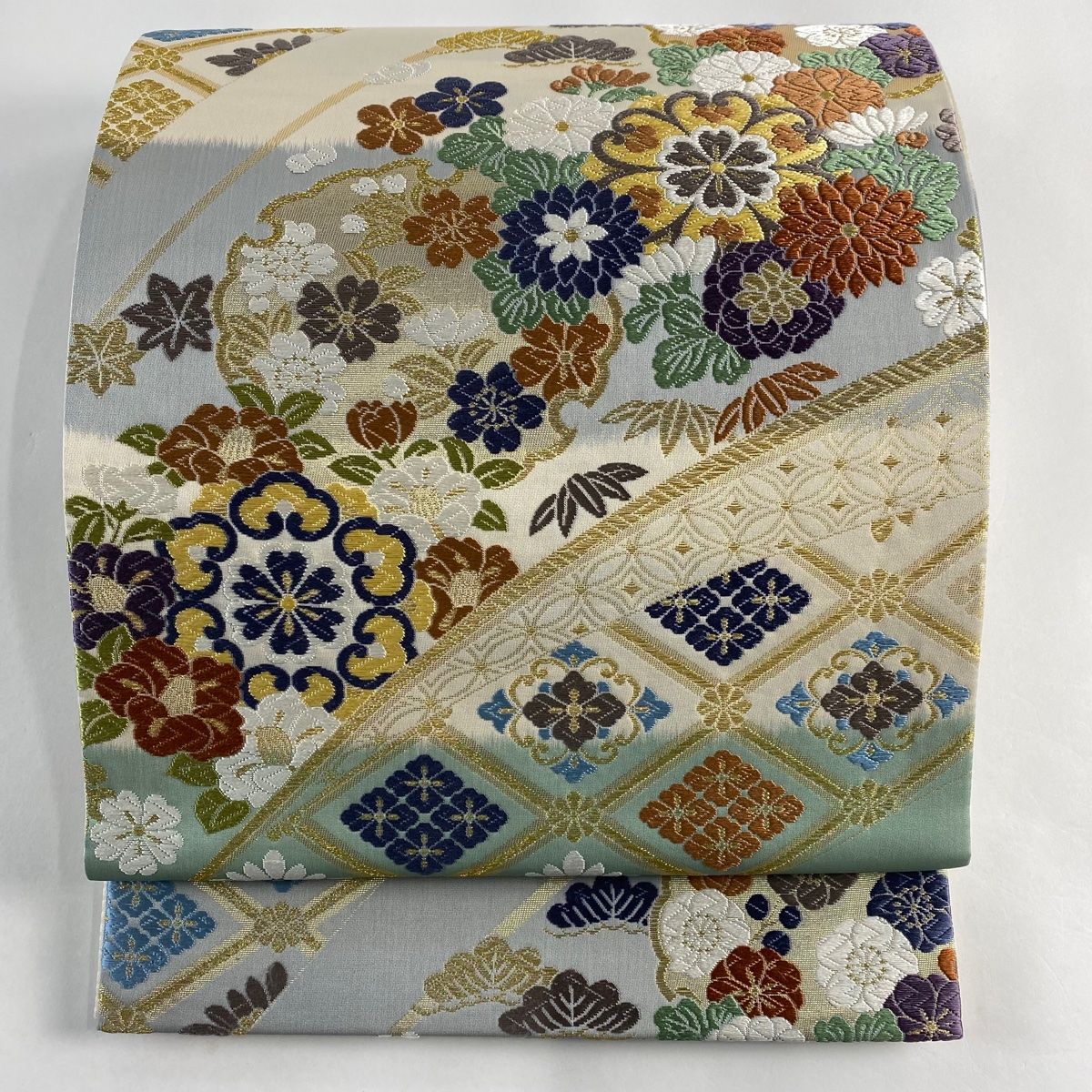 袋帯 美品 秀品 有織万彩 華文 草花 唐織 金糸 クリーム 六通