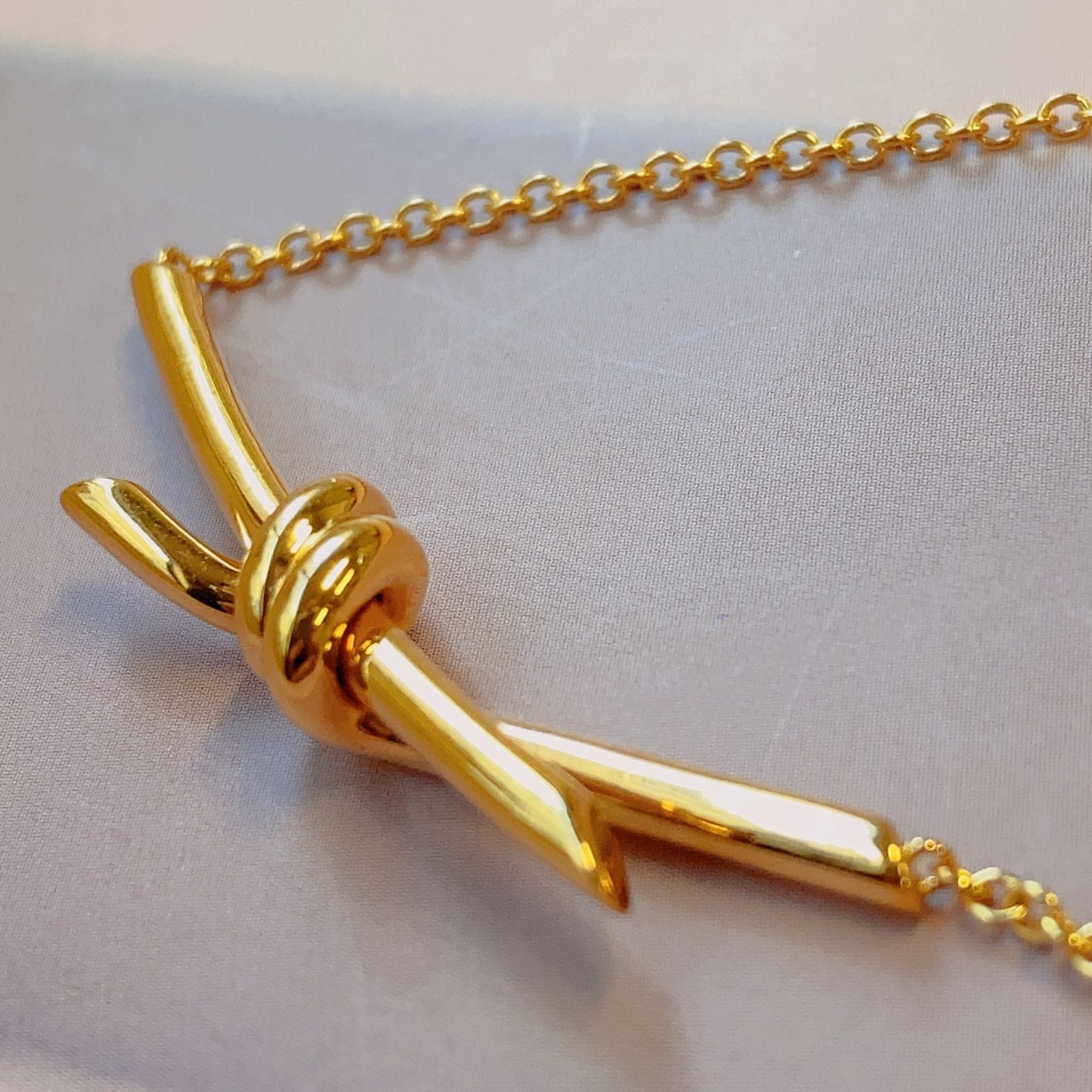 人気♪ TIFFANY & CO Tiffany ノットネックレス Gold - メルカリ