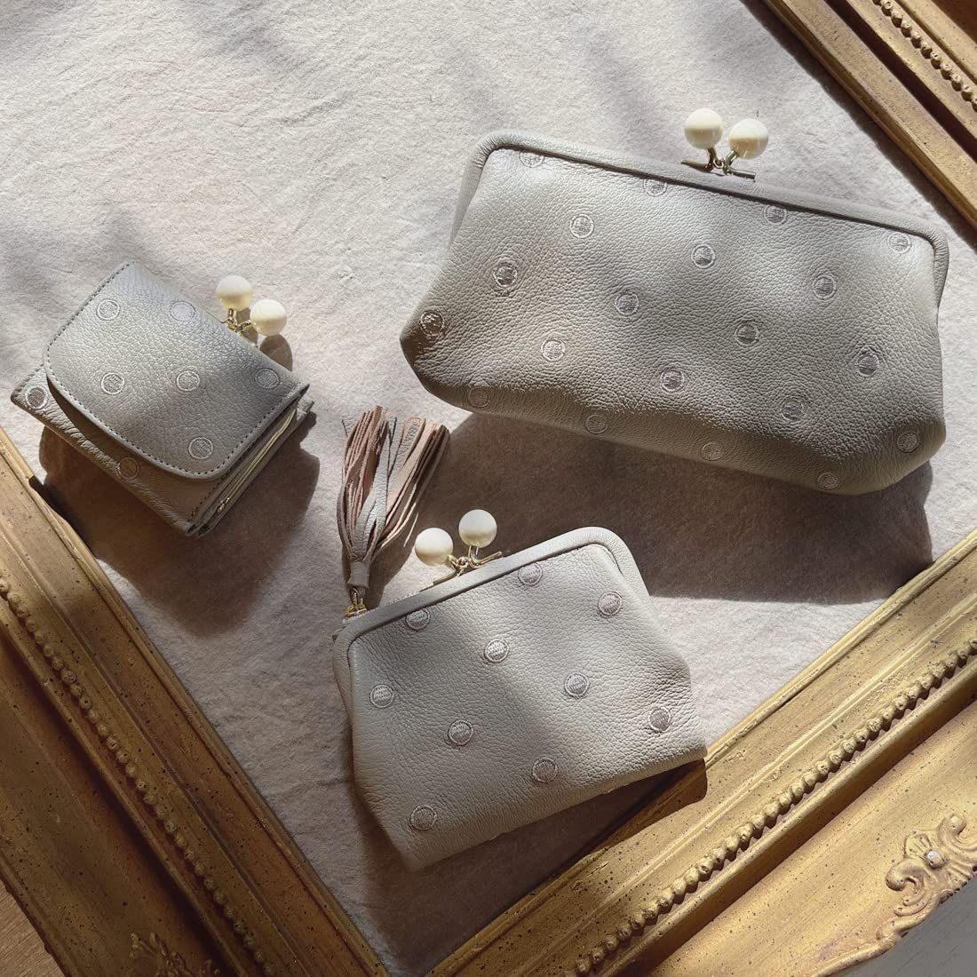 ペルケ アクリル玉がま口長財布