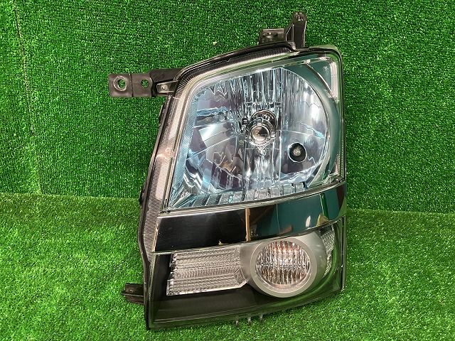 中古パーツ ワゴンR MH22S ｽﾃｨﾝｸﾞﾚｰ MH22S 左ヘッドライト(HID) 純正
