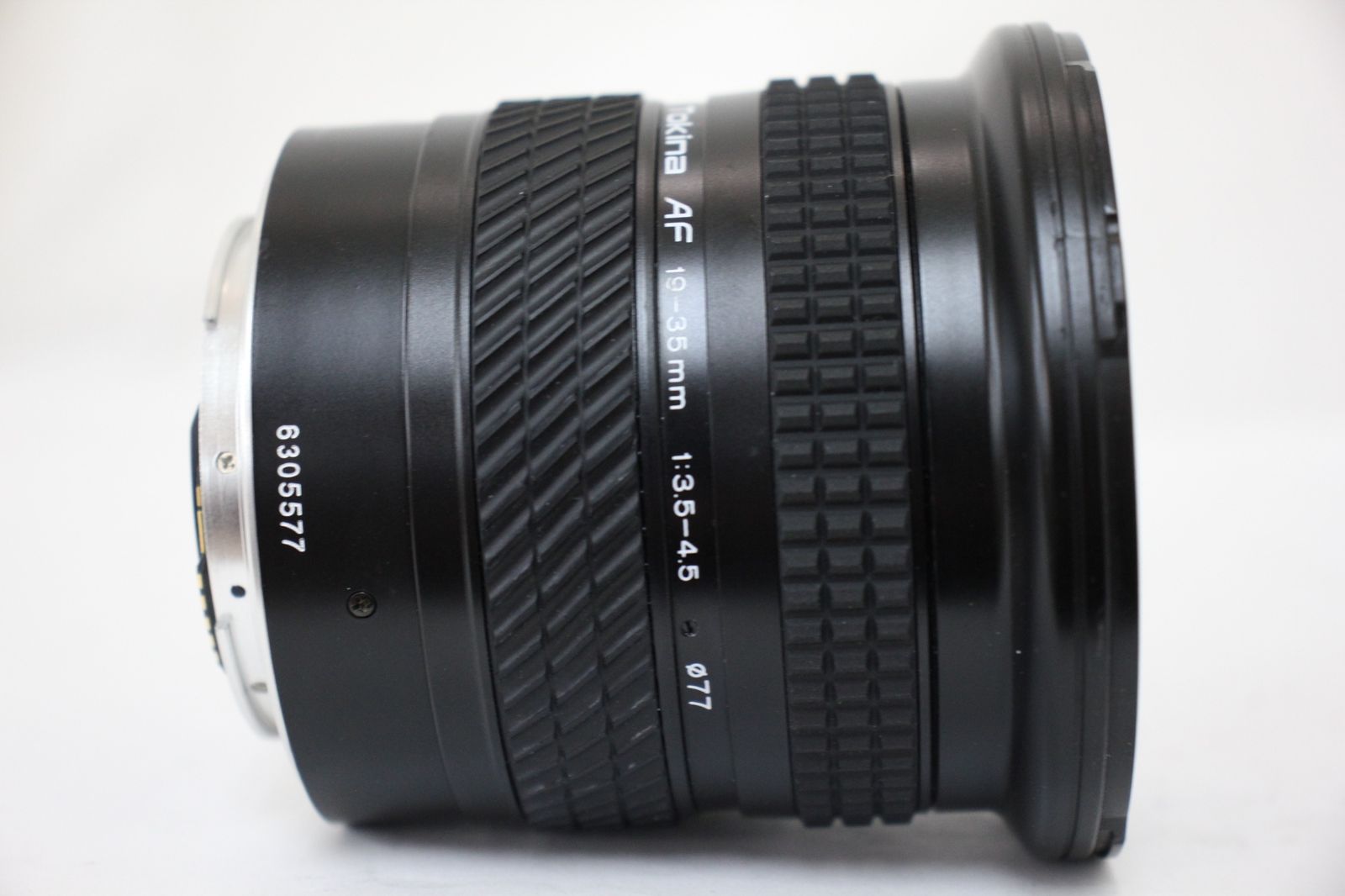  品 トキナー Tokina AF 19-35 mm F 3.5-4.5 キャノンマウント フード 前後キャップ付き レンズ e 2323 レンズ(ズーム) カメラ