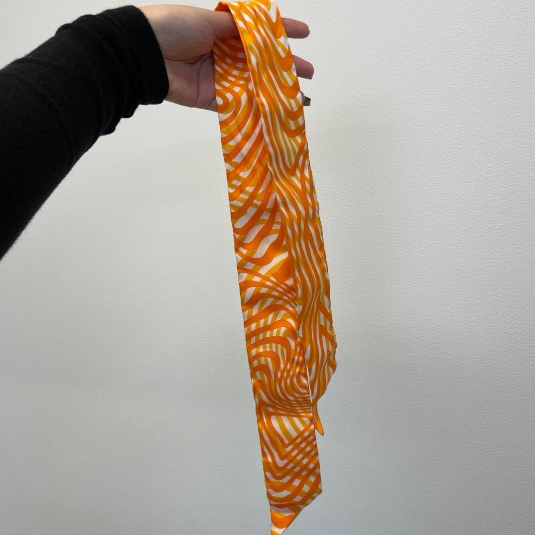 HERMES（エルメス）ツイリー 棒スカーフ シルク100％ オレンジ系