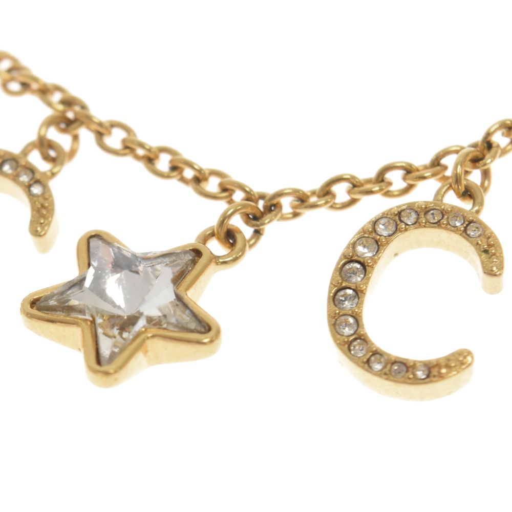 GUCCI (グッチ) スクリプト ロゴネックレス スター ディテール